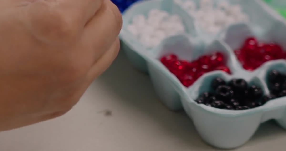 Beads sorted in a tray